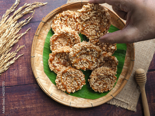 Khao Tan - Thai dessert of fried dried rice top with caramelized sugar  photo