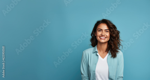 Smiling Woman Against a Solid Color Background