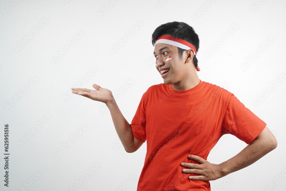 Naklejka premium Man pointing at something - Indonesia independence day