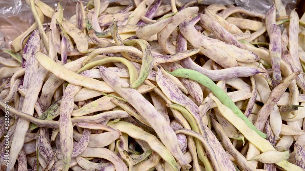 Bean pod for sale at the market. Fresh bean pods in the store. Bean pod for sale at the market. Fresh bean pods in the store.