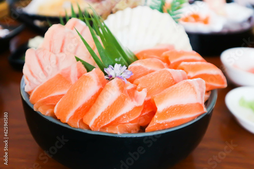 raw salmon, sashimi or sliced salmon and burnt salmon