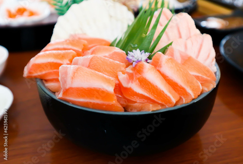 raw salmon, sashimi or sliced salmon and burnt salmon