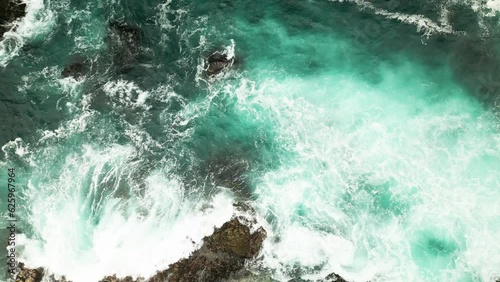 Coastal water. Waves hitting rocks. Turquoise water