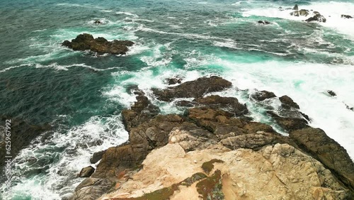Coastal water. Waves hitting rocks. Turquoise water