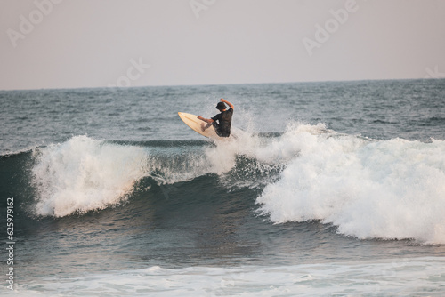 Photography Man Surfing The Waves in SurfCity El Salvador
