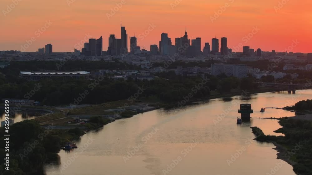 Warsaw city panorama over the Vistula river during sunset. Warsaw city panorama over the Vistula river during sunset.