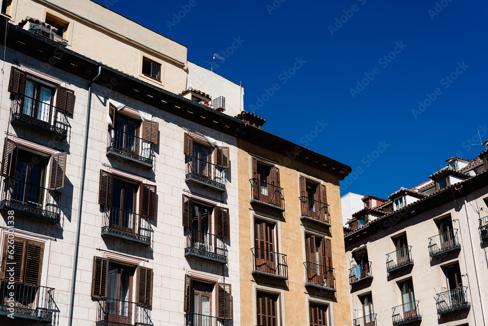 Luxury old residential buildings in Serrano Street in Salamanca neighborhood in central Madrid. Low angle view against sky