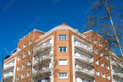 Luxury old residential buildings in Serrano Street in Salamanca neighborhood in central Madrid