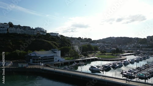 Wallpaper Mural Torquay, Torbay, South Devon, England: DRONE VIEWS: The drone reverses away from Torquay Marina showing the English Riviera Wheel, the Princess Theatre and boats and yachts in the marina.  Torontodigital.ca