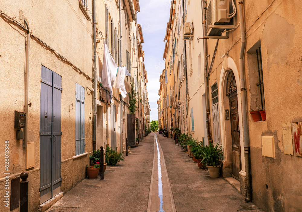 typical street in a picturesque village on the french riviera in the mediterranean