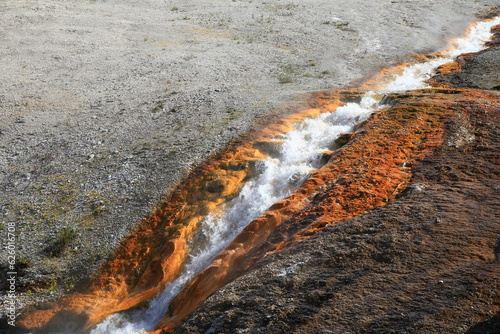 hot spring water flowing through a rock in Yellowstone National Park