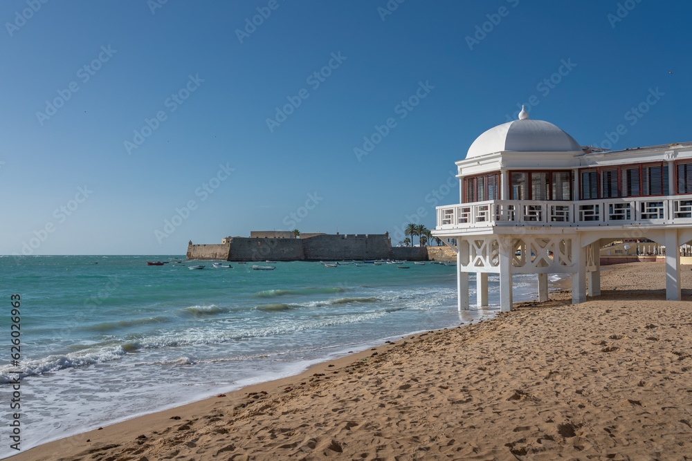 Fototapeta premium La Caleta Beach, Balneario de la Palma Building and Castle of Santa Catalina - Cadiz, Andalusia, Spain
