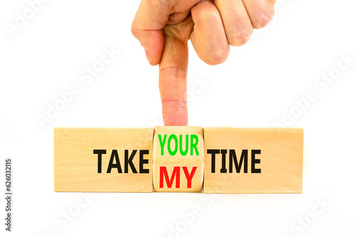 Take your or my time symbol. Concept words Take your or my time on wooden cubes. Businessman hand. Beautiful white table white background. Business and Take your or my time concept. Copy space.