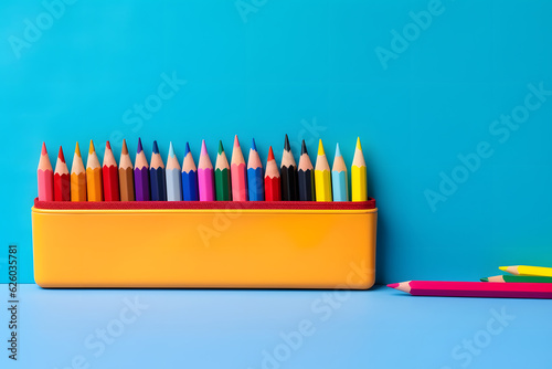 A colorful pencil case filled with a variety of colorful pencil photo