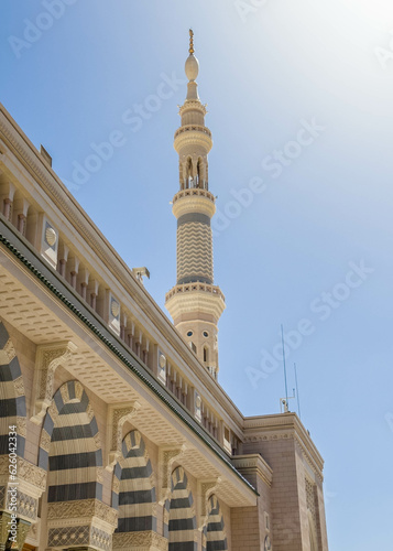The mosque was founded by Prophet Muhammad. The famous umbrellas and minaret of the Prophet's Mosque. Masjid an-Nabawi.
