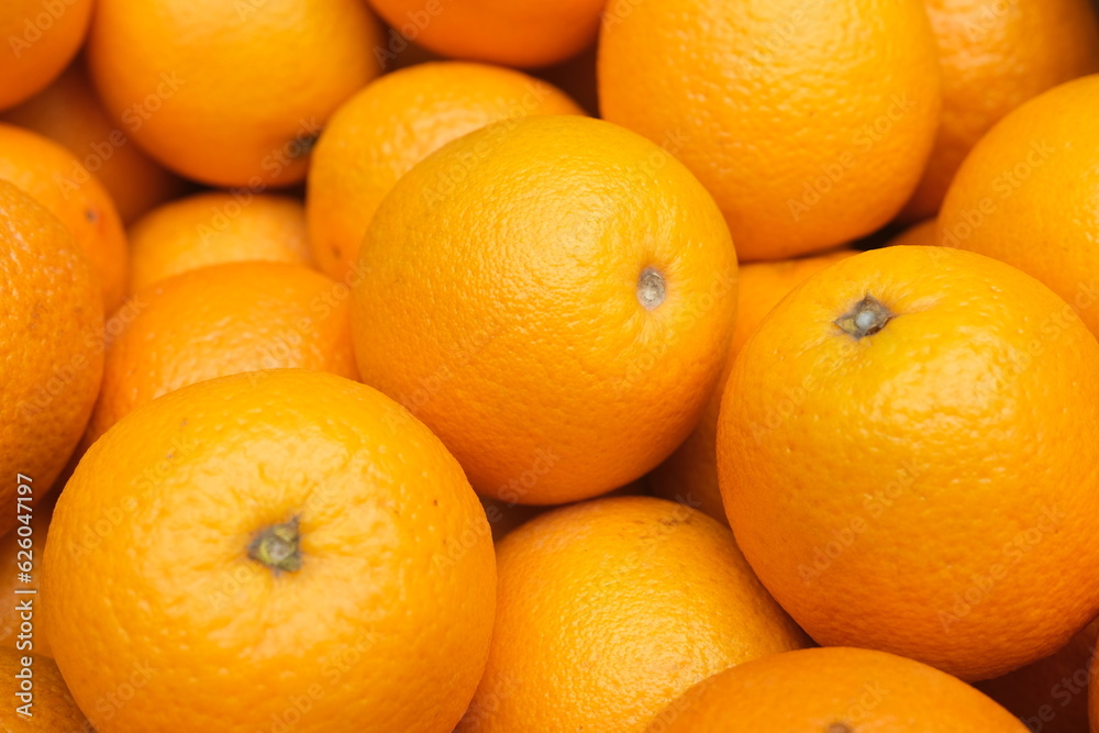 Fresh oranges texture , in bright light Fresh oranges texture , in bright light