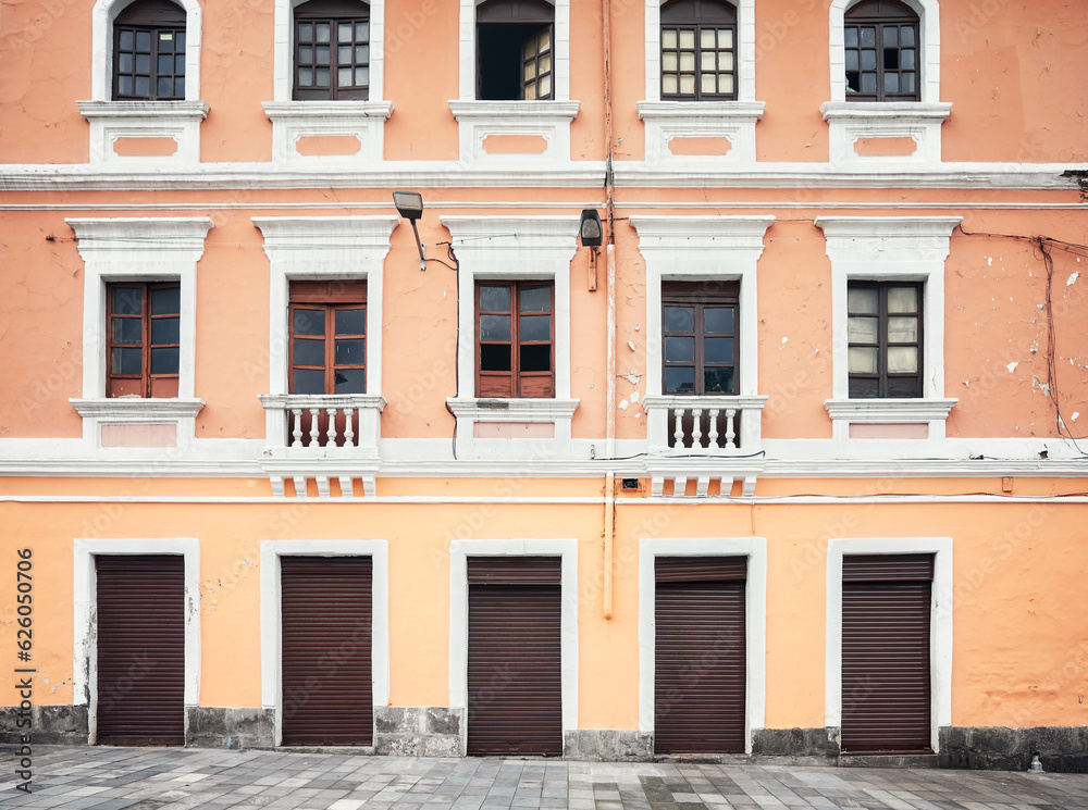 Street view of an old building facade, architecture background, Quito, Ecuador. Street view of an old building facade, architecture background, Quito, Ecuador.
