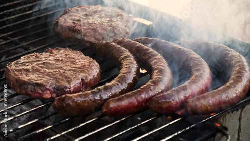 Summer Hot Day Barbecue Grilling On Charcoals Fire Burning Cooking Smoking Carnivore Diet Beef Pork Chicken Meat Sausages Steaks And Vegetables