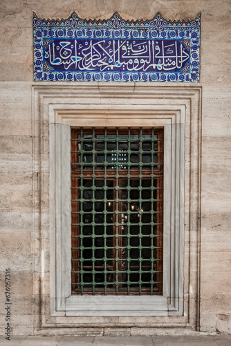 a window of the suleiman mosque allows people during prayer time