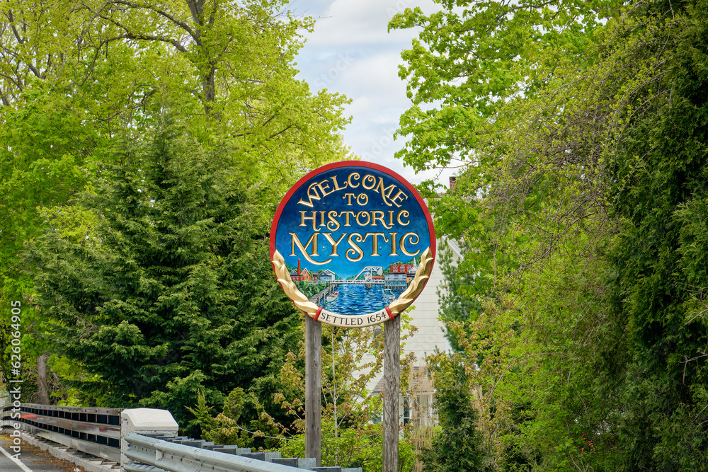 Mystic, CT May 4, 2023 This is one of the 4 hand carved wooden signs that you to the