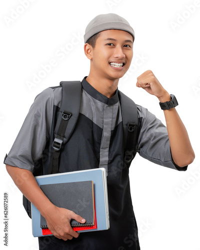 Portrait of smiling asian muslim college student with books and backpack isolated on white background. ready to school concept.