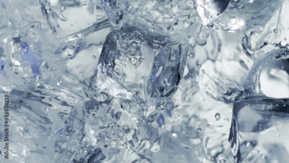 Super Slow Motion Shot of Falling and Splashing Perfect Ice Cubes into Water at 1000fps. Super Slow Motion Shot of Falling and Splashing Perfect Ice Cubes into Water at 1000fps.