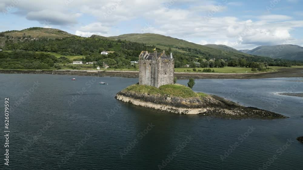 Aerial shot of Medieval castle surrounded by water on the east coast of Scotland in Argyll, UK. Aerial shot of Medieval castle surrounded by water on the east coast of Scotland in Argyll, UK.