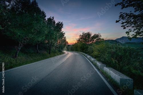 Asphalt road at sunset - Zahara de la Sierra, Andalusia, Spain