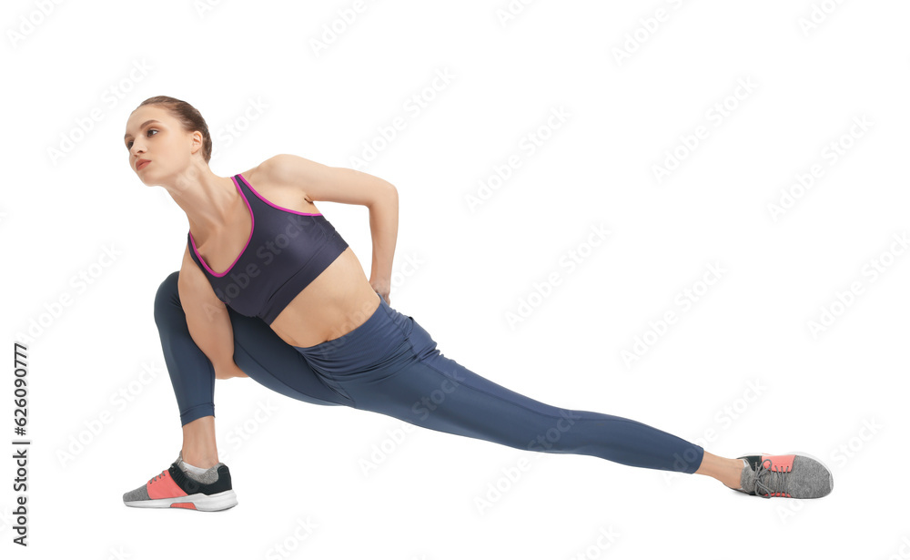 Yoga workout. Young woman stretching on white background