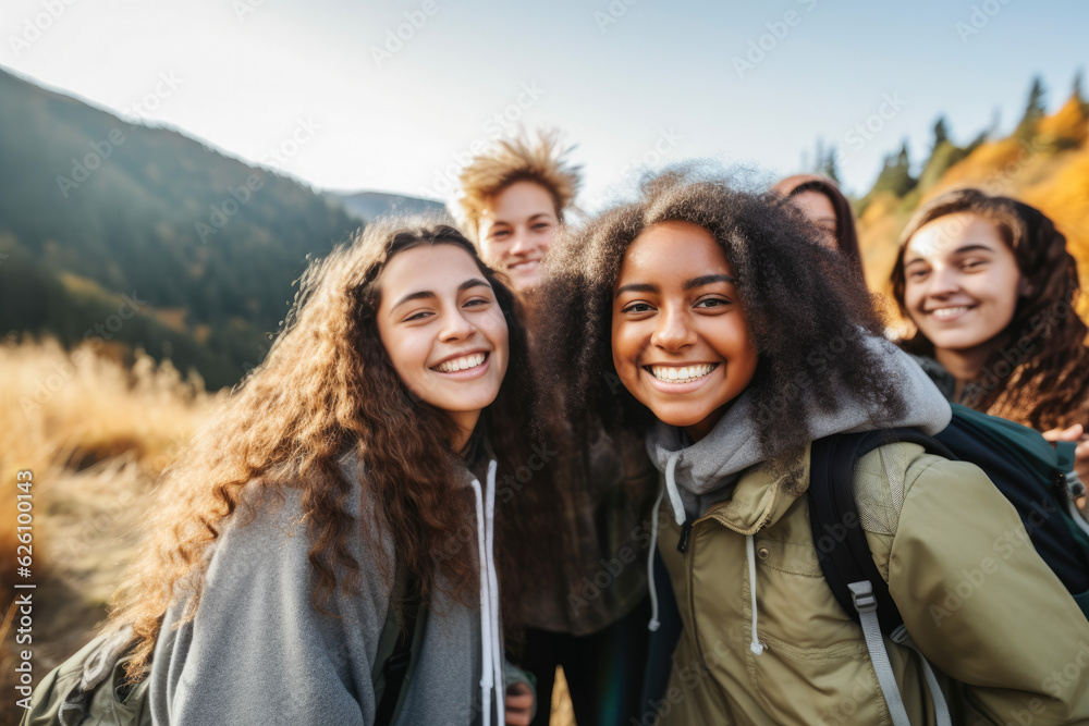 Diverse group of teenagers hiking and enjoying nature, a group of young friends exploring the great outdoors, embracing an active lifestyle in nature