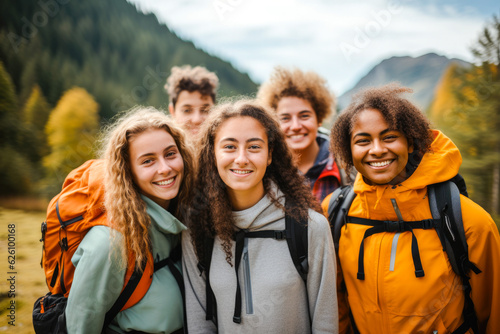 Diverse group of teenagers hiking and enjoying nature, a group of young friends exploring the great outdoors, embracing an active lifestyle in nature © MVProductions