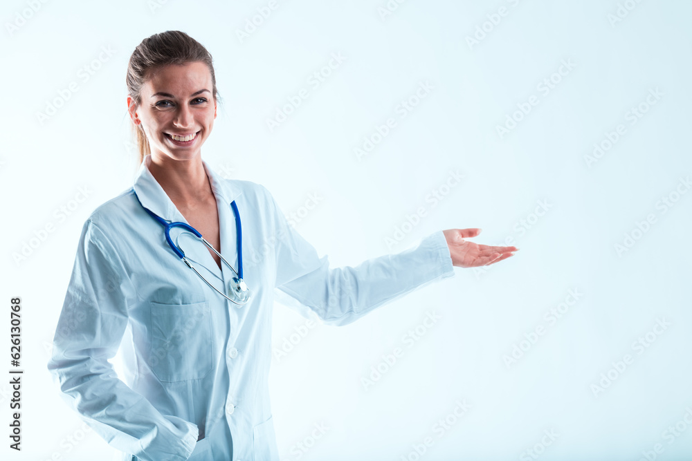 Doctor in white, points to COPYSPACE product Doctor in white, points to COPYSPACE product