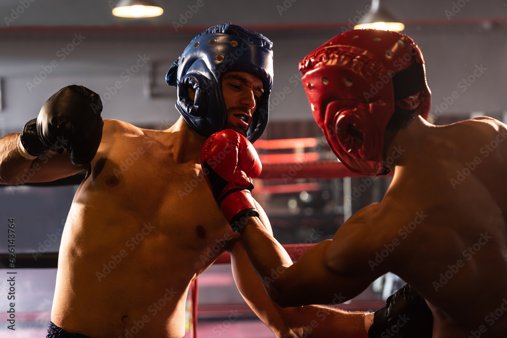 Two athletic and muscular body boxers with safety helmet or boxing head
