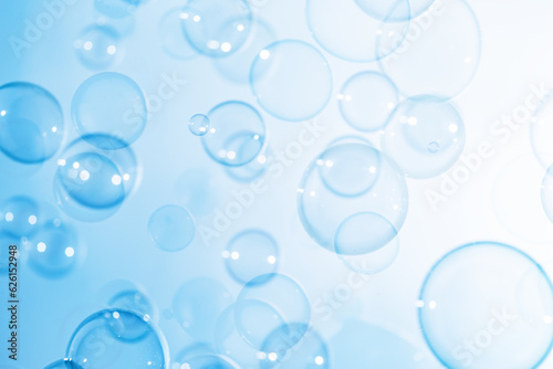 Beautiful Transparent Blue Soap Bubbles Floating in The Air. Abstract Fun Background, Celebration Festive Backdrop, Refreshing of Soap Suds Bubbles Water.