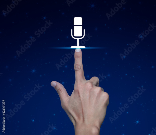 Hand pressing microphone flat icon over fantasy night sky and moon, Business communication concept