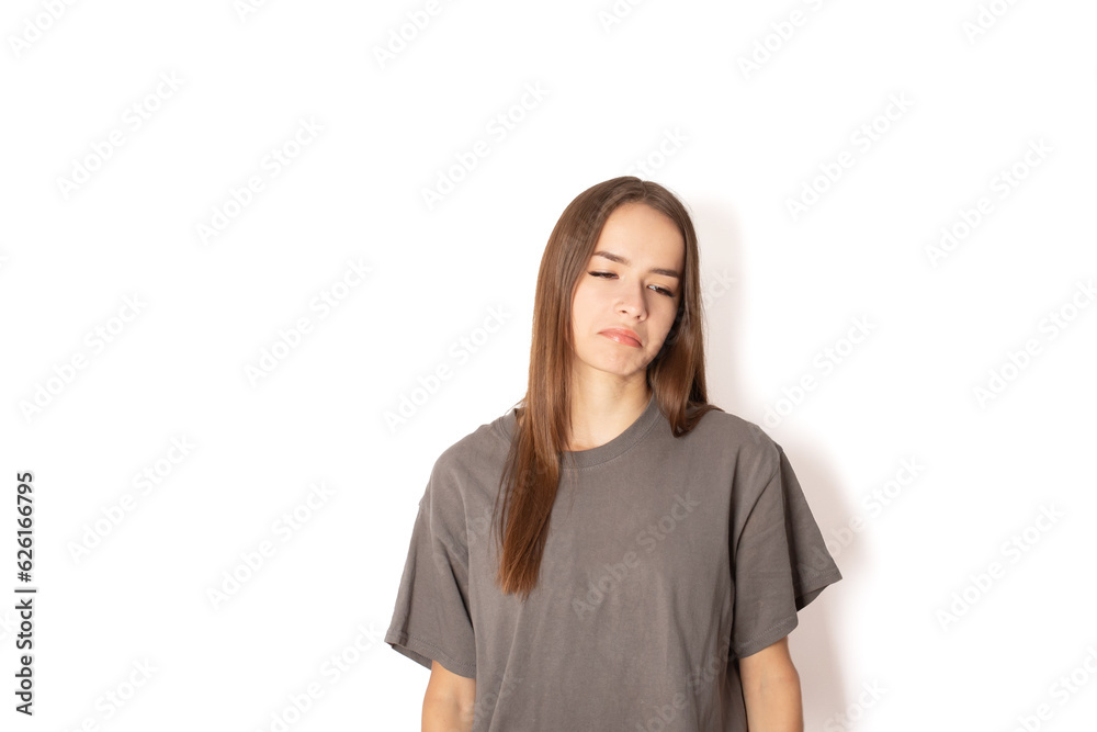 upset teenager, student lowered his head, young woman unhappy on white background upset teenager, student lowered his head, young woman unhappy on white background