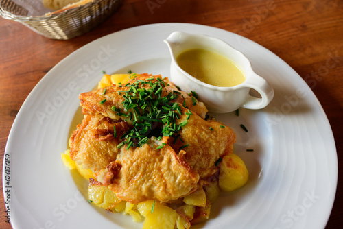 Hamburger Pannfisch, a Traditional Dish from Hamburg with Fried Fish, Roast Potatoes and a Mustard Sauce