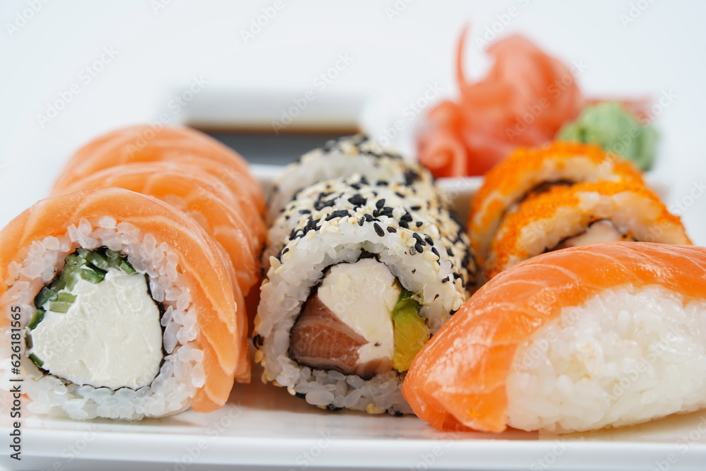Japanese traditional Cuisine - Set of Nigiri sushi and sushi rolls Japanese traditional Cuisine - Set of Nigiri sushi and sushi rolls