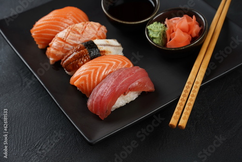 Japanese traditional Cuisine - Set of Nigiri sushi topped with sake(Salmon), Maguro (Tuna), Unagi(Freshwater Eel)