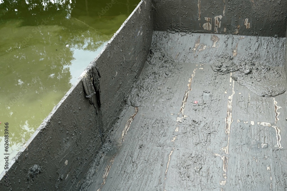 A garbage boat stay on the canal for preparing dredging. A garbage boat stay on the canal for preparing dredging.