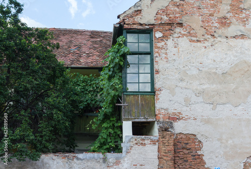 The wall of an old residential building in the city of Sibiu. Romania