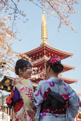 Japanese women near Five story pagoda, Tokyo photo