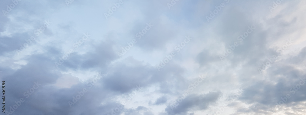 Panorama of cloudy sky before thunderstorm, sky with clouds, panoramic background. Panorama of cloudy sky before thunderstorm, sky with clouds, panoramic background.