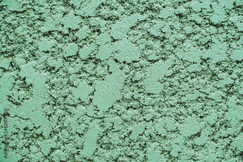 Arrière-plan mur en pierre craquelé texturé vert