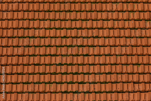 brown ceramic roof tiles close-up