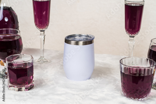 Expertly composed mockup featuring a white wine tumbler in a minimalistic drink arrangement