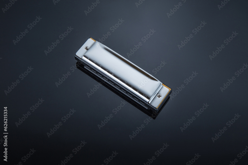 A compact harmonica instrument tool A compact harmonica instrument tool