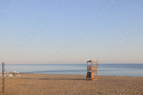 Fototapeta Naklejka Na Ścianę i Meble -  Lifeguard tower on a deserted beach in Alanya, Turkiye, on May 3, 2023.