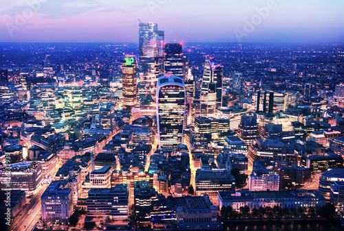 Obraz na plátne City of London business and banking area at nigh with beautiful lit up skyscrapers and streets