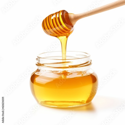 Honey in jar and and wooden stick isolated on white background